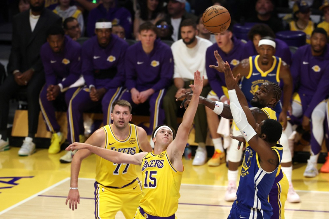 Naveza Dončić - Reaves ustavila tudi volkove